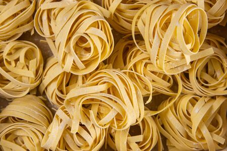 Pasta fettuccine background. Top views close-up. Macrophotographyの写真素材