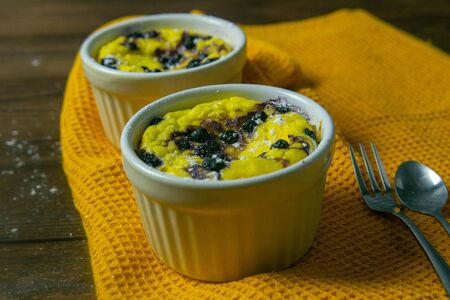 Homemade cottage cheese casserole, prepared with your own hands. The taste is indescribable by photography. Top views, close-up.の写真素材