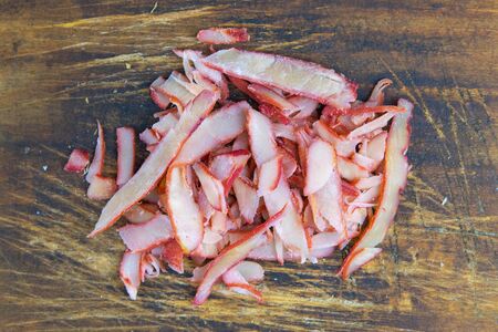 Crab rings on wooden background. Snack Fish to beer. Close up.の写真素材