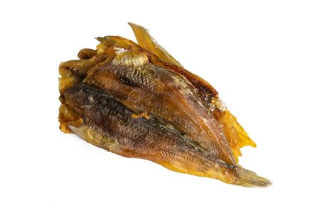 Dried blue whiting fish on a white background. Snack to beer. Close up.の写真素材