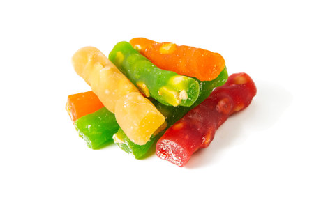 Heap of colorful Turkish delight isolated on white background. Front views, close-up