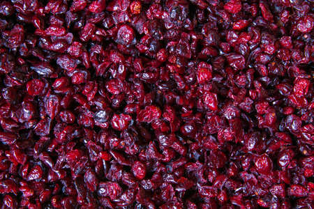 Delicious dried cranberries background. Top views, close-upの写真素材