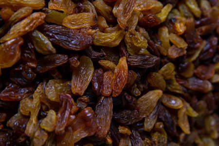 Raisins as background Grape Raisin texture. Top views, close-upの写真素材