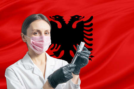 Happy young white girl holding Azerbaijan flag isolated on a white background.の写真素材