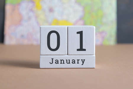 January 1 on the wooden calendar. The first day of the winter month, a calendar for the workplace. Autumn.の写真素材