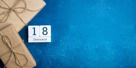 January 18 on the wooden calendar. The eighteenth day of the winter month, a calendar for the workplace. Winter.の写真素材