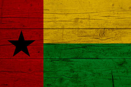 Flag of Guinea-Bissau. Wooden texture of the flag of Guinea-Bissau.の写真素材