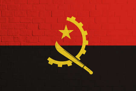 Flag of Angola. Brick wall texture of the flag of Angola.の写真素材