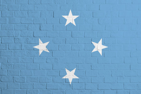 Flag of Federated States of Micronesia. Brick wall texture of the flag of Federated States of...