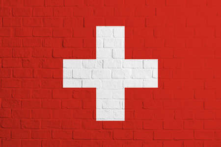 Flag of Switzerland. Brick wall texture of the flag of Switzerland.の写真素材