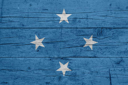 Flag of Federated States of Micronesia. Wooden texture of the flag of Federated States of Micronesia.の写真素材