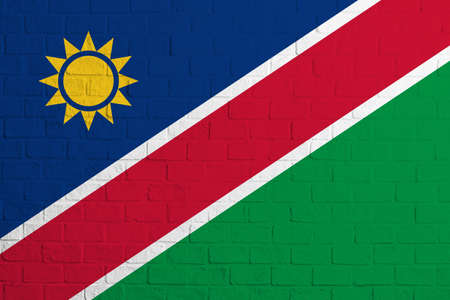 Flag of Namibia. Brick wall texture of the flag of Namibia.の写真素材