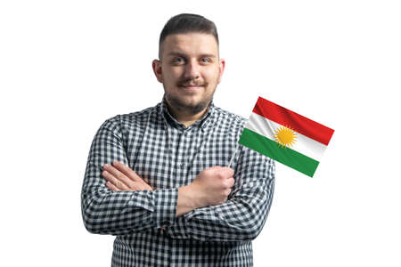 White guy holding a flag of Kurdistan smiling confident with crossed arms isolated on a white background.の写真素材