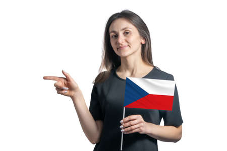 Happy young white woman holding flag Czech Republic and points to the left isolated on a white background.の写真素材
