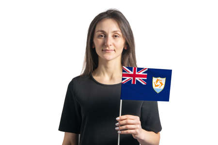 Happy young white girl holding Anguilla flag isolated on a white background.の写真素材
