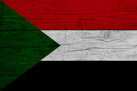 Flag of Sudan. Wooden texture of the flag of Sudan.の写真素材