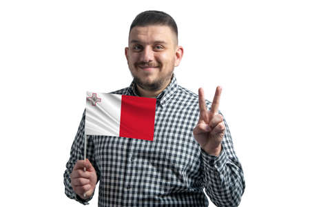 White guy holding a flag of Malta and shows two fingers isolated on a white background.の写真素材