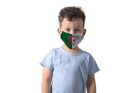 Respirator with flag of Algeria. White boy puts on medical face mask isolated on white background.の写真素材