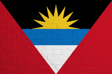 Flag of Antigua and Barbuda. Brick wall texture of the flag of Antigua and Barbuda.