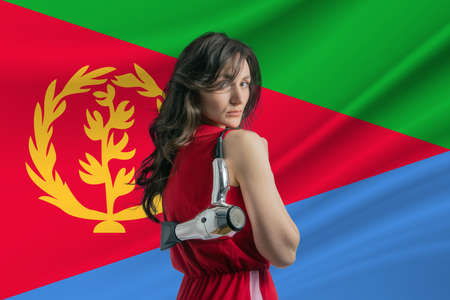Beauty industry in Eritrea Happy female hairdresser holding hairdryer against Eritrea flag background.の写真素材