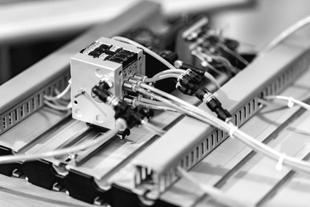 Automated Assembly line of mechanical engineering. Shallow depth of field. The background is blurred.の写真素材