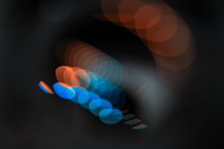 Multicolored abstract round highlights. Shot in a defocused image of lens flare.