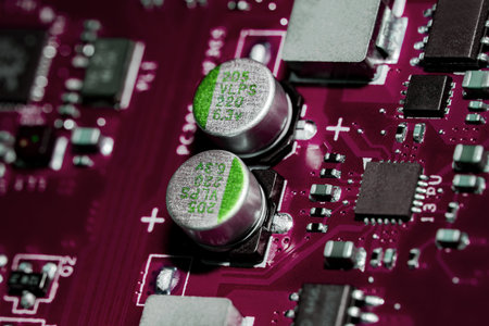 A close-up microchip with many electrical components placed on the Board. The background is blurred.