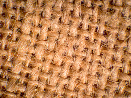 Close-up of hemp, brown fibers with gaps between fibers, high magnification, super macro.
