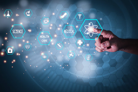A man pointing at a medical symbol, symbolizing science, health care and public health. High tech circle backgroundの写真素材