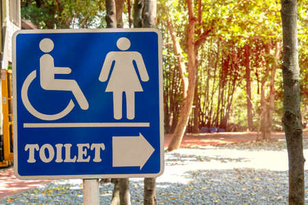 Toilet sign for women and disabled people Provide directions for walking and wheelchairs. It is a place that is natural but has living facilities, clean and hygienic.の写真素材