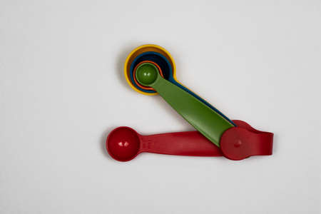 Measuring spoons, several sizes of spoons in the same set, top view of measuring spoons, 1 Tbsp, 1/2 Tbsp, 1 Tsp, 1/2 Tsp, 1/4 Tsp.の写真素材