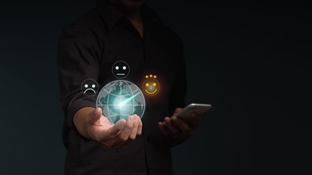 The businessman hold a world map with smile and 3 stars icon for customer services best excellent...