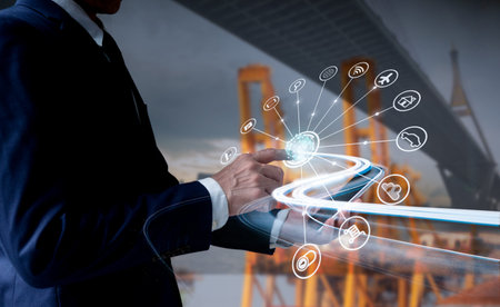 Businessman employing cellphone for logistic network distribution and smart transportation, as well...
