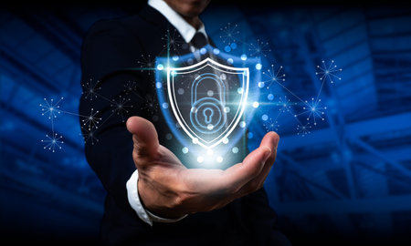 Businessman holding a shield with a padlock on a worldwide networking connection, Data protection...