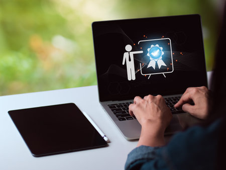 A laptop computer demonstrates the quality assurance, guarantee, standards, ISO certification, and standardization concept.の写真素材