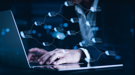 Blockchain financial technology enables secure online transfers of bitcoin,other cryptocurrencies.Concept of finance and cybercrime with connected encrypted ledger blocks displayed on computer screen.の写真素材