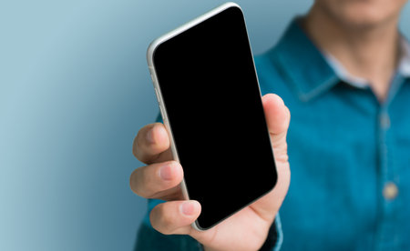 man holding mobile phone in hand, set of different angles and positionsの写真素材