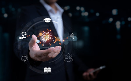 The concept of e-learning technologies or online courses.A man with a virtual screen Training, Internet on education, study of knowledge for creative thinking concept and issue solution.の写真素材