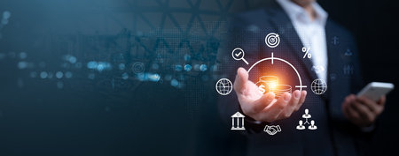 Financial growth and investment strategy for global business success. Hand holding digital coin icons with business and finance symbols for future development.の写真素材