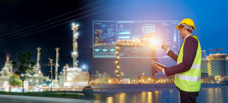 Industrial engineer managing smart energy plant with touch screen interface, high-tech dashboard in...