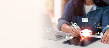 A person pursuing knowledge through digital platforms, with a stylus touching tablet and a laptop in...
