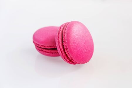 Strawberry macarons on white backgroundの写真素材