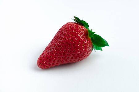 Strawberry with strawberry leaf on white backgroundの写真素材