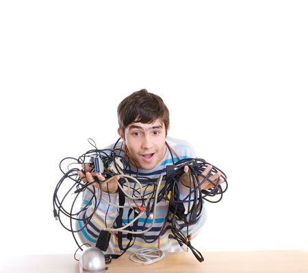 The young guy with cables isolated on a white backgroundの写真素材