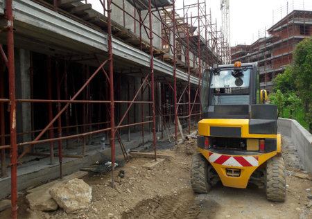 Work in progress on the construction site in the summer - build
