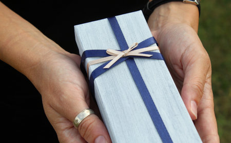 Gift in the hands of a woman