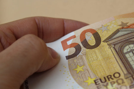 Counting 50 euro banknotes - wealth