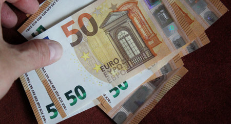 50 euro banknotes in the hands of a man