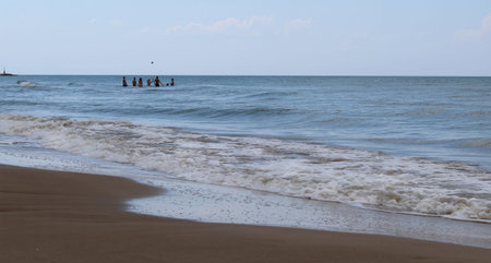 Waves on the shore at the sea on a summer day