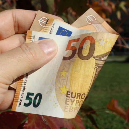 50 euro banknotes in the hands of a rich manの写真素材